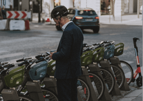 Closeup of man unlocking bike